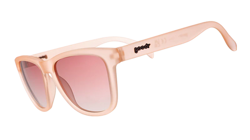 Pink square-shaped sunglasses with pink gradient lenses.