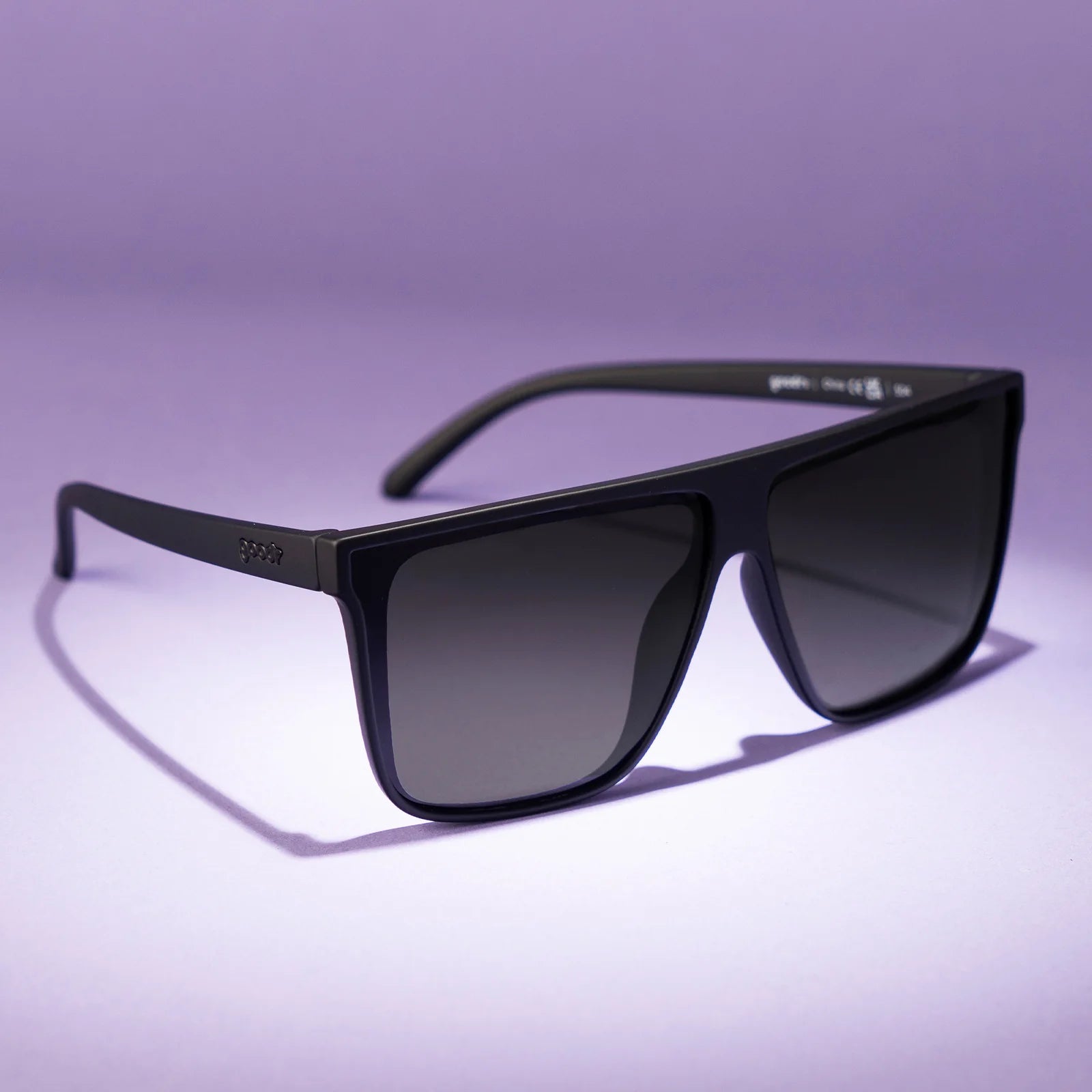Black wide-fit, oversized sunglasses with non-reflective lenses.