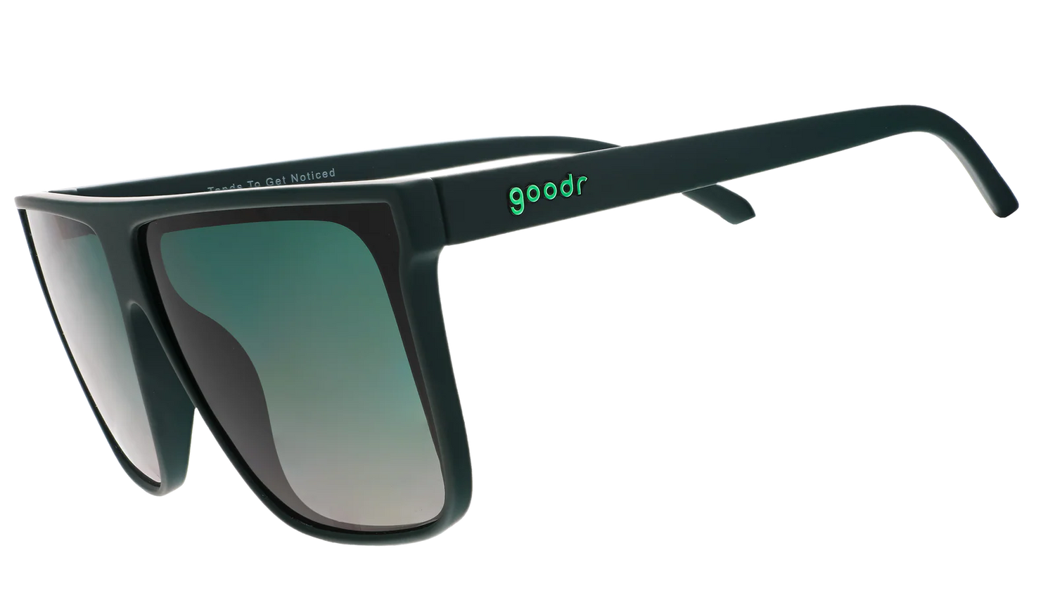 Dark green oversized flat-top sunglasses with gradient lenses for better ground visibility.
