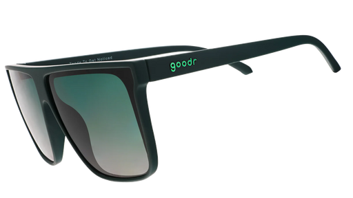Dark green oversized flat-top sunglasses with gradient lenses for better ground visibility.
